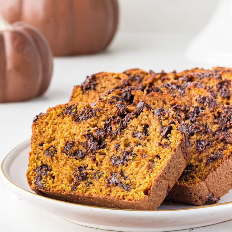 sliced pieces of chocolate chip pumpkin bread on a plate